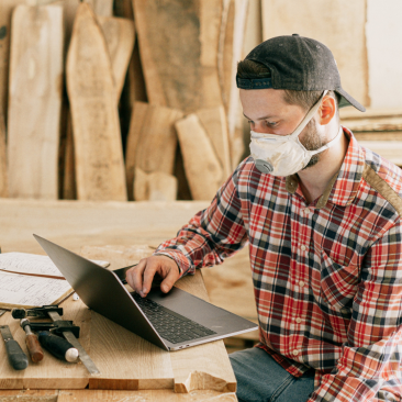 man looking at computer